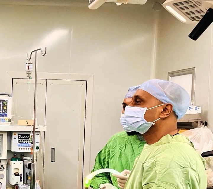 Dr Prasad Bhukebag in the operating theatre during laparoscopic surgery